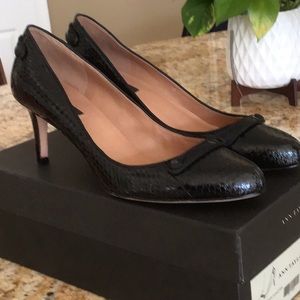 Black “reptile” leather kitten heeled pumps.